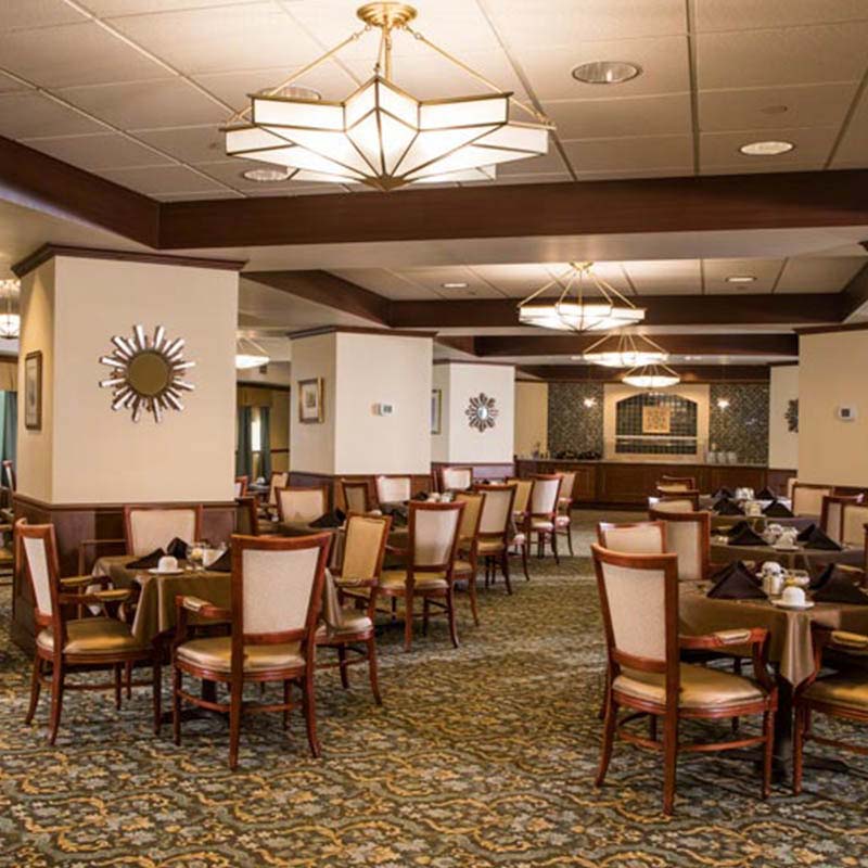 A clean open dining area for 10 Wilmington Place senior living residents to gather and feast