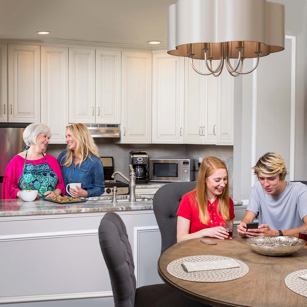 Mother-and-Daughter-baking-cookies-in-the-kitchen-of-a-10-Wilmington-Place-home