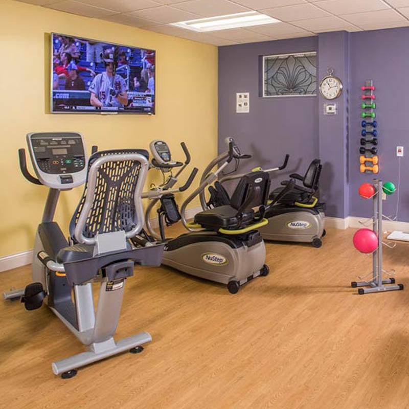 10 Wilmington Place fitness center shown with various workout equipment