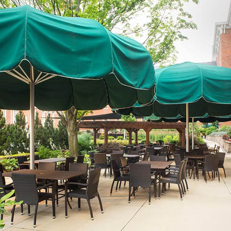 gorgeous outdoor patio seating areas with umbrellas, tables, and chairs in Dayton