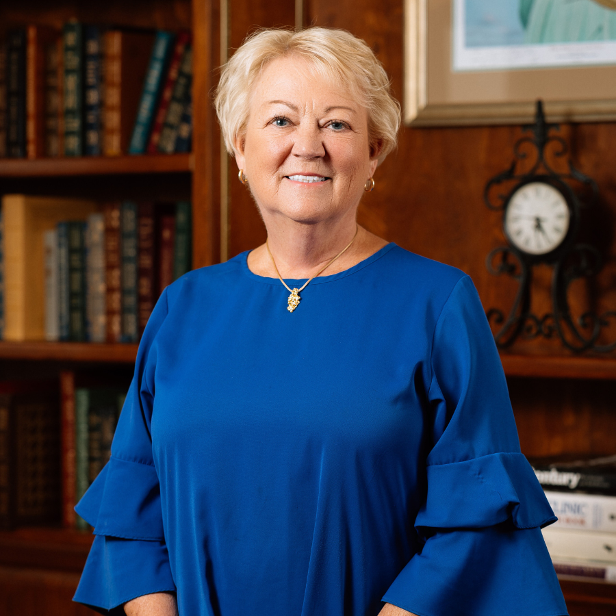 Myra Lowden, Sales Counselor at 10 Wilmington Place, smiles for the camera