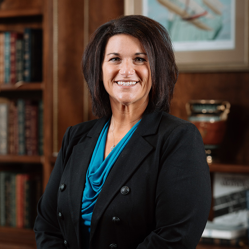 10 Wilmingon Place Executive Director Tiffany Bolin smiles for the camera