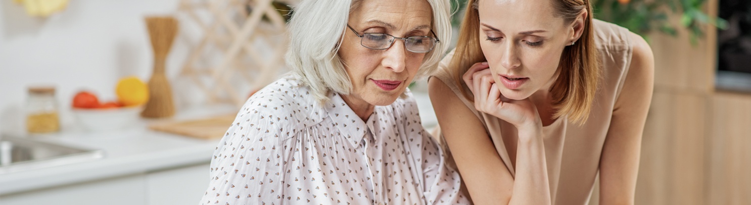 10 Wilmington Place female resident working on paperwork with daughter.